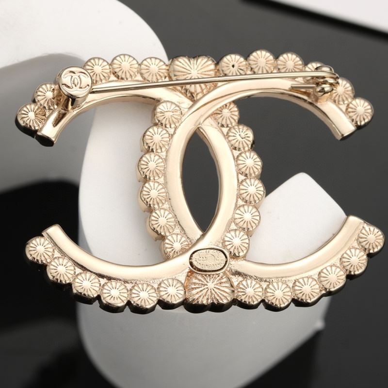 Ch**el brooches